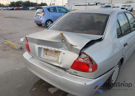 1999 Mitsubishi Mirage De из США, поврежденный, VIN JA3AY26A9XU047201